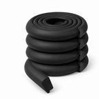 Coiled soft foam edge bumper strip in black on a white background